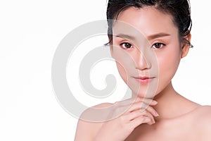 Beautiful Young Asian Woman with Clean Fresh Skin. Face care, Facial treatment, Cosmetology, beauty and healthy skin and cosmetic