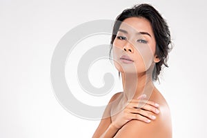 Beautiful Young Asian Woman with Clean Fresh Skin. Face care, Facial treatment, on white background, Beauty and Cosmetics Concept