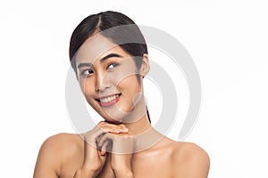Beautiful Young Asian woman clean fresh skin with hands touching face