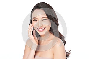 Beautiful young asian woman with clean fresh skin on white background Face care Facial treatment Cosmetology beauty and spa 