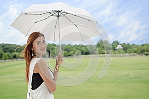 Beautiful young Asian woman in the countryside