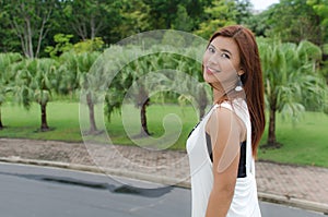 Beautiful young Asian woman in the countryside