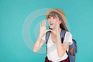 Beautiful young asian woman shouting sound loud with mouth for announce something in vacation travel with excited