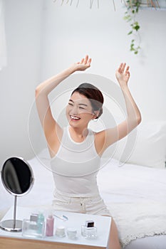 Beautiful young Asian woman show armpit that slick white
