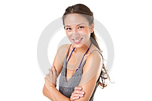 Beautiful young asian woman smiling with arms crossed against isolated white background