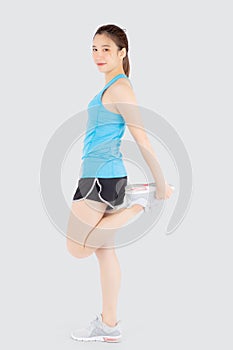 Beautiful young asian woman in sport standing stretch muscle leg exercise with healthy isolated on white background