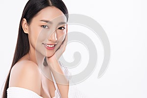 Beautiful Young  Asian Woman touching her clean face with fresh Healthy Skin, isolated on white background, Beauty Cosmetics and