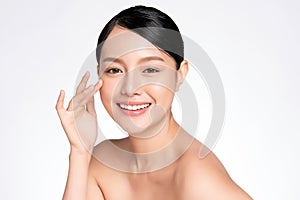 Beautiful Young asian Woman touching her clean face with fresh Healthy Skin, isolated on white background, Beauty Cosmetics and