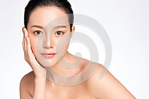 Beautiful Young asian Woman touching her clean face with fresh Healthy Skin, isolated on white background, Beauty Cosmetics and
