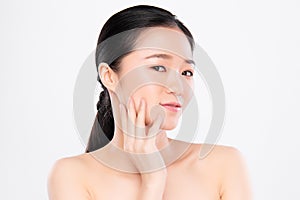 Beautiful Young asian Woman touching her clean face with fresh Healthy Skin, isolated on white background, Beauty Cosmetics and