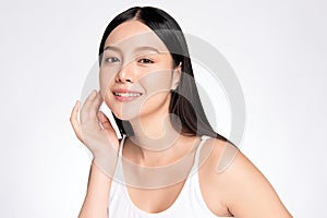 Beautiful Young asian Woman touching her clean face with fresh Healthy Skin,  on white background, Beauty Cosmetics and