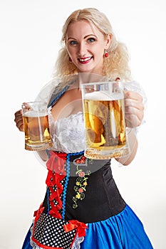 Beautiful young blond girl of oktoberfest beer stein