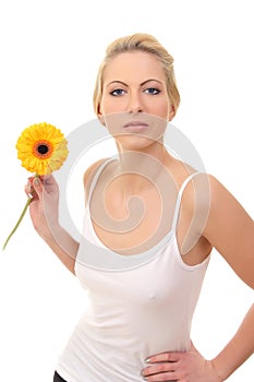 young blond woman with a flower in her hands