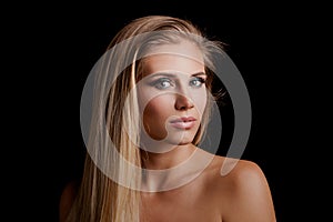 Beautiful young blonde green eyes woman with long straith health
