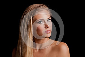 Beautiful young blonde green eyes woman with long straith health