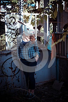 Beautiful young blonde rabbit mask woman