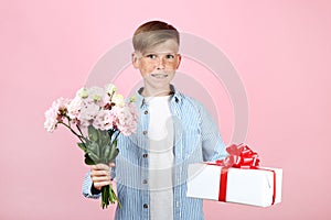 Young boy with eustoma flowers