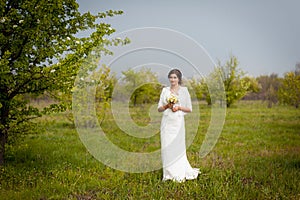 Beautiful young bride in luxury wedding dress