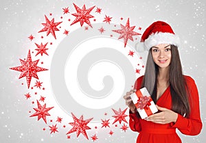 Beautiful young brunette woman as santa girl