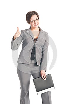 Beautiful young business woman holding a portfolio