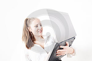 Beautiful young business woman with laptop