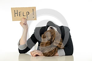 Beautiful young business woman overwhelmed and desperate holding a help sign