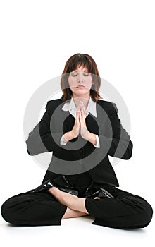 Beautiful Young Business Woman In Suit Meditating