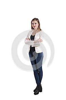 Beautiful young businesswoman jacket, jeans whole height