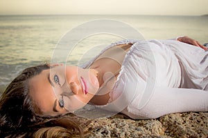 Beautiful young caucasian girl at the beach