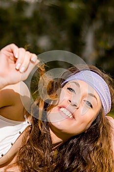 Beautiful young caucasian girl at the park