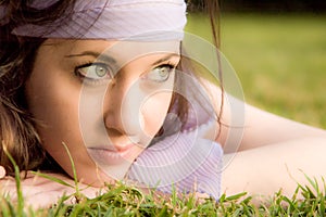 Beautiful young caucasian girl at the park