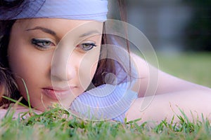 Beautiful young caucasian girl at the park