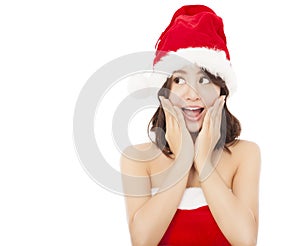 Beautiful young christmas woman making a funny expression