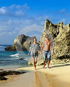 Beautiful young couple on the coast