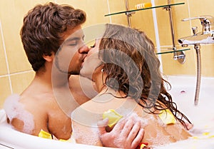 Beautiful young couple enjoying a bath