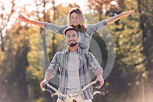 Couple with a tandem bicycle