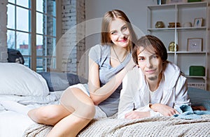 Beautiful young couple at home