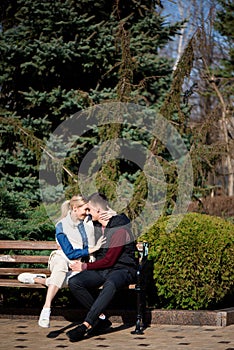 Beautiful young couple in love walks in the park