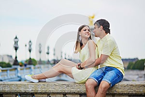 Beautiful young dating couple in Paris