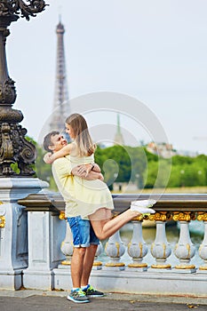 Beautiful young dating couple in Paris