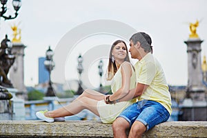 Beautiful young dating couple in Paris