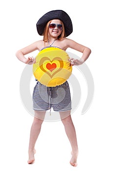 Beautiful young elementary age school girl with big yellow smile