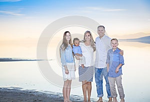 Beautiful Young family portrait on the beach