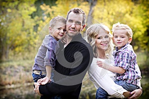 Beautiful Young Family Portrait with Fall colors