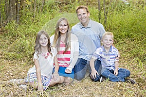 Beautiful Young Family Portrait outdoors