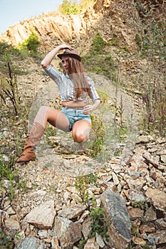 Beautiful young fashion model ginger woman enjoying outside in nature