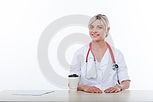 Beautiful young female physician is working with