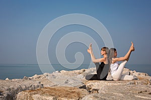 Beautiful young female practicing yoga