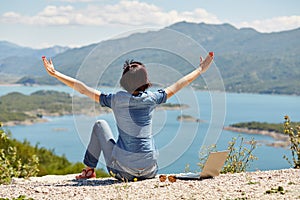 Beautiful young freelancer woman using laptop