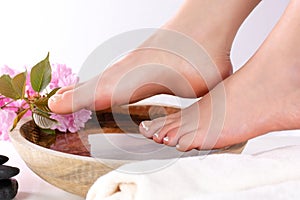 Indulge in Serenity: Beautiful Feet with French Nails Polish in a Spa Studio